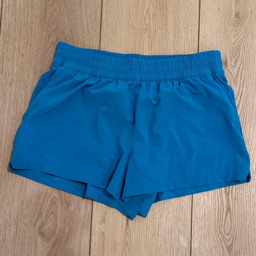 Athleta weekender run Blue Athletic Shorts size M